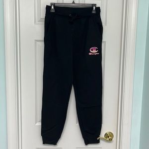 Champion, size S, black joggers with pink champion emblem